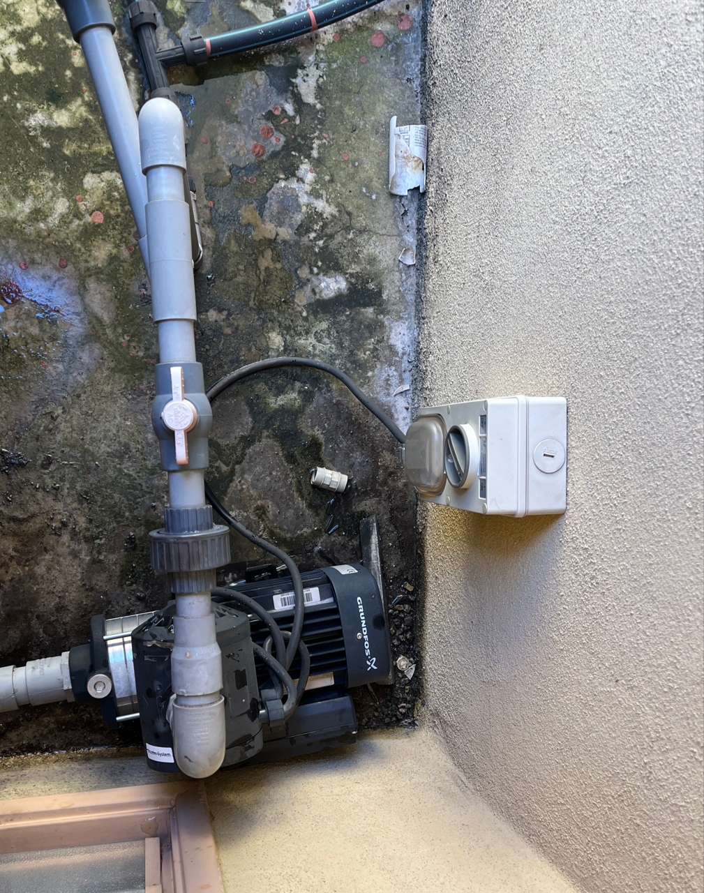grundfos-water-pump-near-the-water-tank Newly Renovated Bathroom